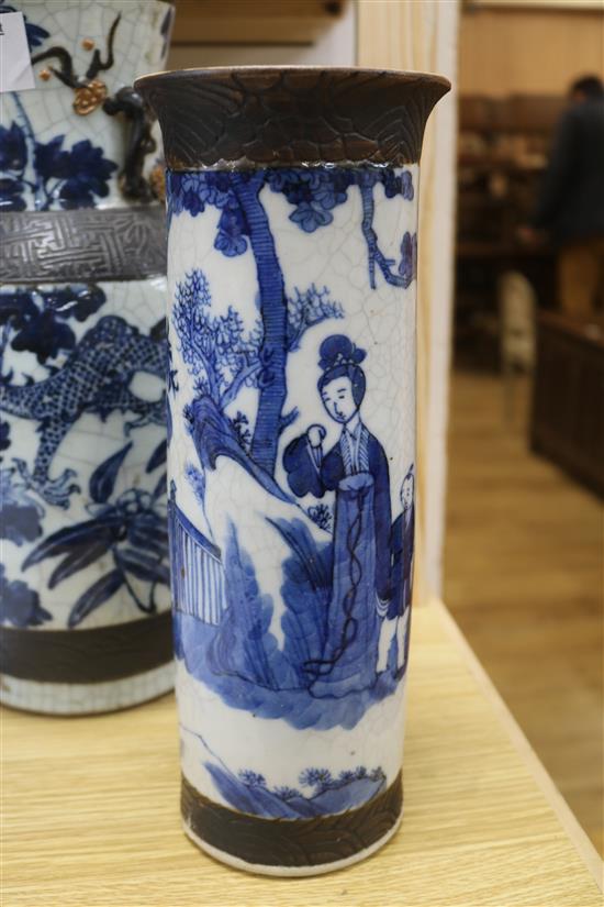 A Chinese blue and white crackleglaze jardiniere and two vases